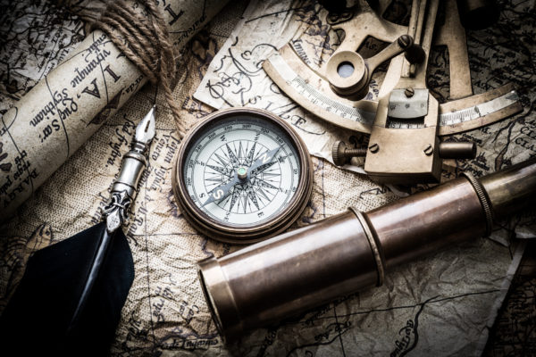 Map and compass and telescope