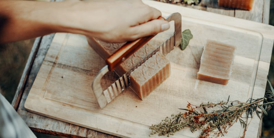 Soap being cut into bars.