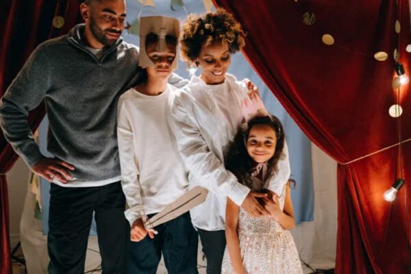 A family participates in a play.
